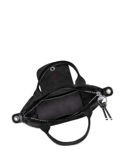Longchamp
Le Pliage Energy XS Handbag