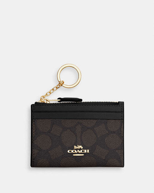 Coach Mini Skinny Id Case In Signature Canvas