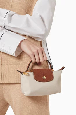 Longchamp
Le Pliage Pouch With Handle