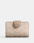 Coach Medium Corner Zip Wallet In Signature Canvas in sand taupe