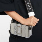 MARC JACOBS
Metallic Sequin Snake Embossed Calfskin Stripe Snapshot Camera Bag Silver