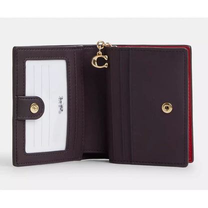 Coach
Snap Wallet In Signature Leather