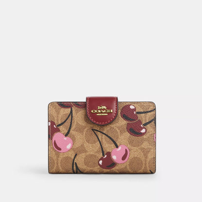Coach Medium Corner Zip Wallet in Signature Canvas with Cherry Print.