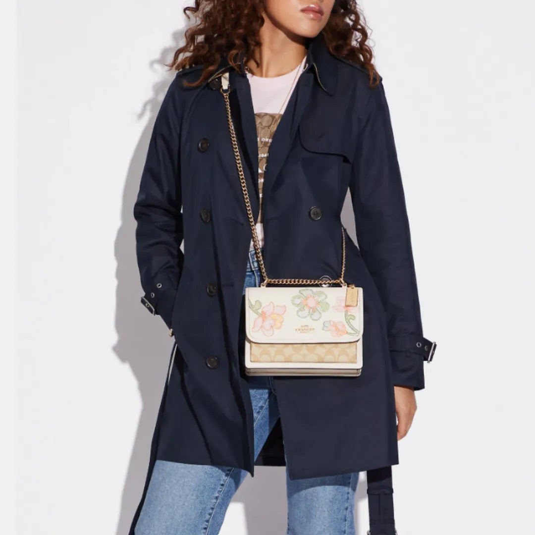 Coach Klare Crossbody bag in signature canvas with a floral print