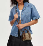 Coach Andrea Mini Carryall Bag In Signature Canvas