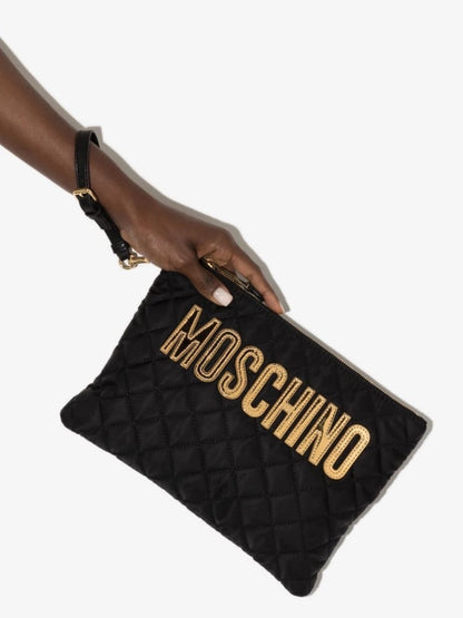 Moschino logo-patch quilted clutch bag