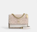 Coach Mini Klare Crossbody Bag In Signature Canvas