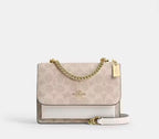 Coach Mini Klare Crossbody Bag In Signature Canvas