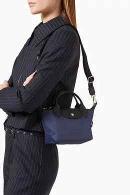 Longchamp
Le Pliage Energy XS Handbag