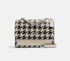 Coach
Klare Crossbody With Houndstooth Print