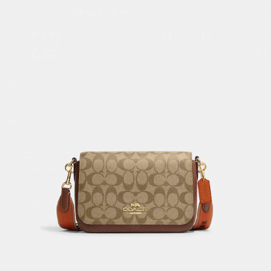 Coach Logan Messenger In Signature Canvas