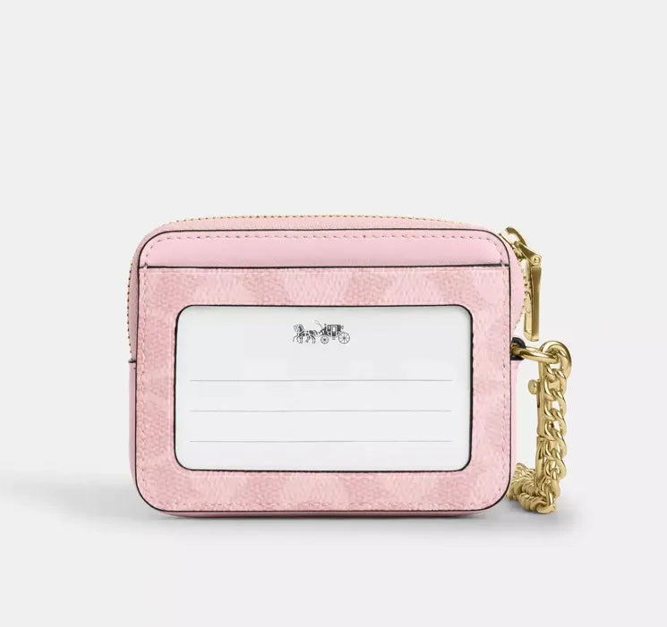 Coach Zip Card Case In Signature Canvas in pink