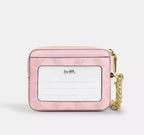 Coach Zip Card Case In Signature Canvas in pink