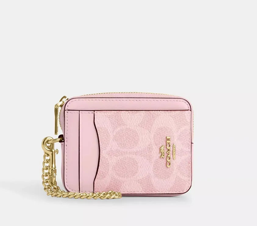 Coach Zip Card Case In Signature Canvas in pink