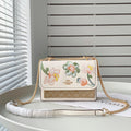 Coach Klare Crossbody bag in signature canvas with a floral print