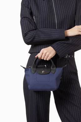 Longchamp
Le Pliage Energy XS Handbag
