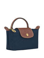 Longchamp
Le Pliage Pouch With Handle