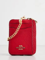 COACH 
Pebbled Leather Zip Card Case