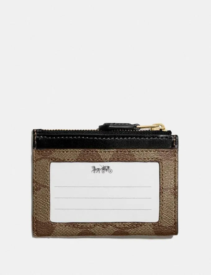 Coach Mini Skinny Id Case In Signature Canvas